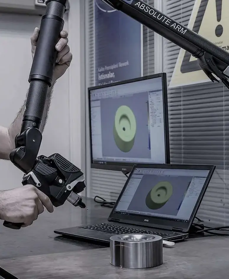 3D scanning with Absolute Arm and laptop.